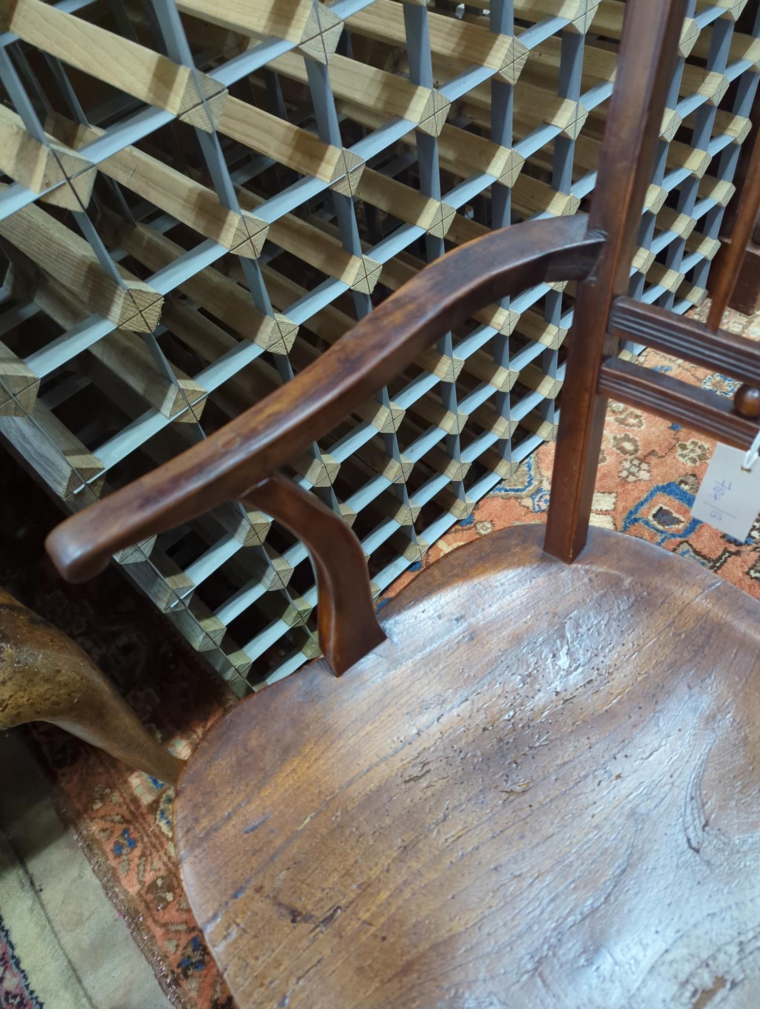 A mid 19th century elm and fruitwood Mendlesham elbow chair by Richard Day, width 48cm, depth 40cm, height 84cm